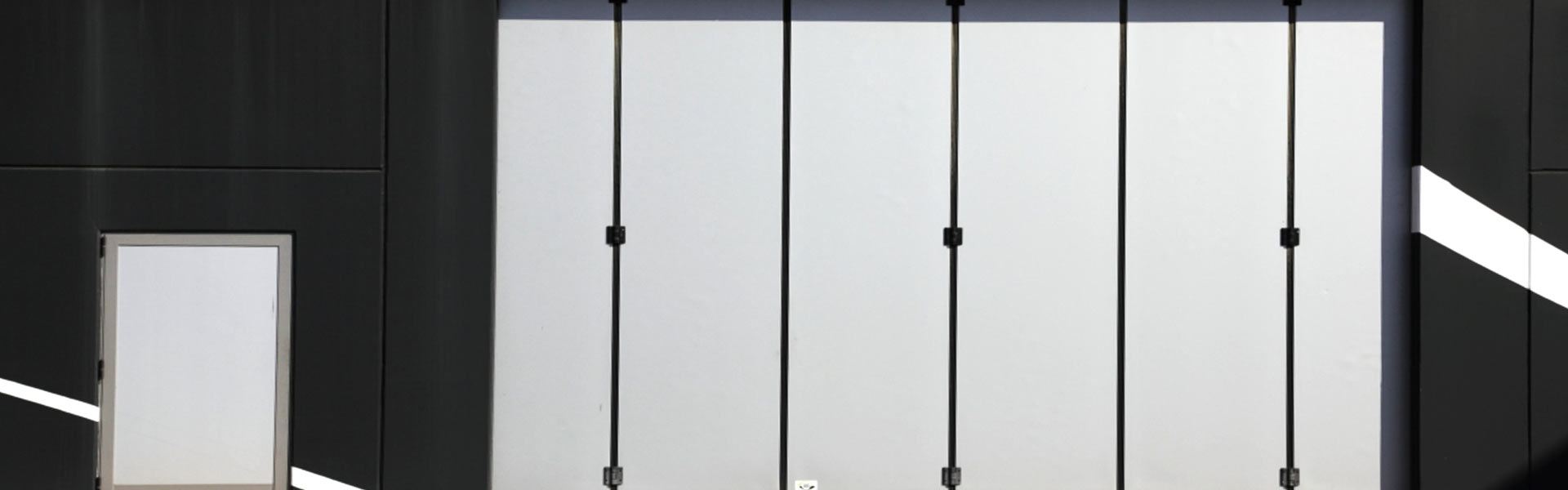 Portoni a libro IRIDIUM DOORS: Spazio ed efficienza in armonia